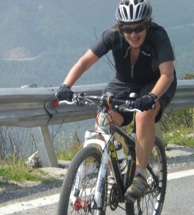 Louise Ryan Cycling on the  tour with redspokes